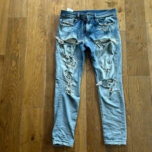 Ripped/Distressed Diesel jeans.
